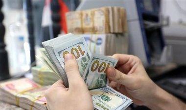 البنك المركزي يوضح بشأن تخفيض حصة المسافرين من الدولار
